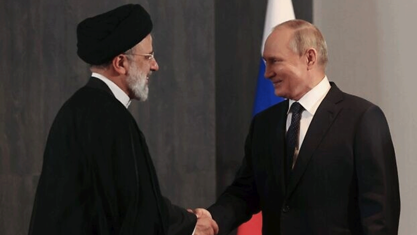 صورة أرشيفية للرئيسين الروسي فلاديمير بوتين والإيراني ابراهيم رئيسي