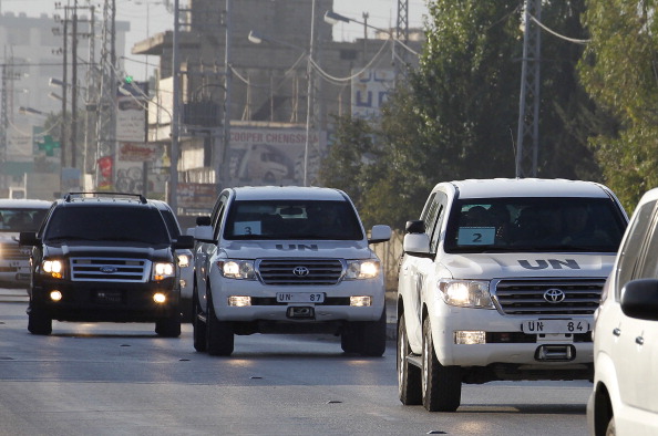 سيارات المفتشين خلال مهمتها في دمشق الشهر الماضي
