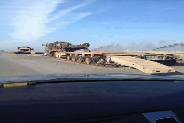 ناقلة دبابات محترقة في الموصل