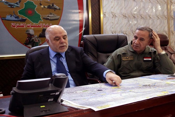 العبادي ووزير الدفاع يطلعان على سير الحرب ضد داعش