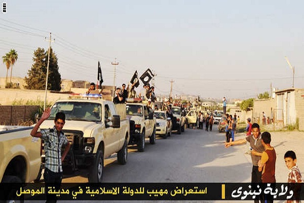 قوات تنظیم داعش فی احدى مناطق الموصل لدى دخوله الى المدینة