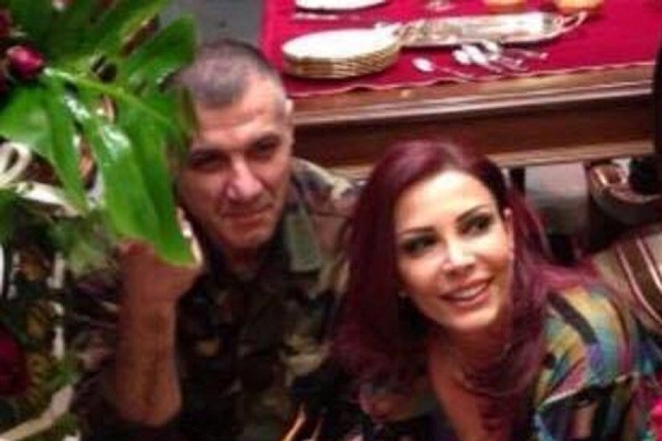 مع زوجها هلال الأسد الذي قتلته المعارضة السورية