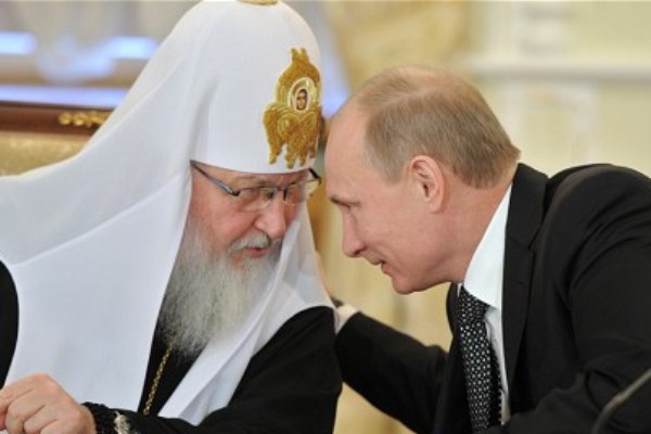 بوتين مع بطريرك الكنيسة الروسية كيريل 