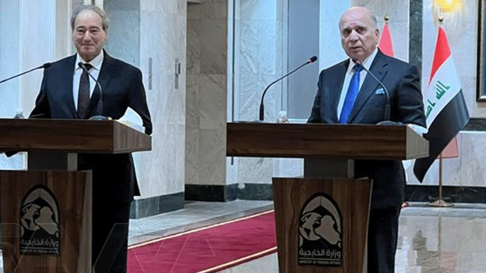 وزيرا الخارجية العراقي فؤاد حسين ونظيره السوري فيصل المقداد خلال مؤتمرهما الصحافي المشترك في بغداد الاحد 4 يونيو 2023 (سانا)